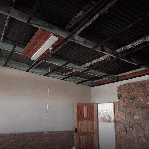 Ceiling Before Installation — RR Roof Waterproofing, Centurion Room with damaged water-stained ceiling boards requiring replacement — Centurion