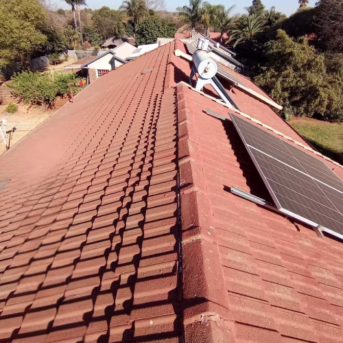 Roof Before Waterproofing Treatment — RR Roof Waterproofing, Centurion Flat roof before waterproofing showing cracking and water pooling — Centurion